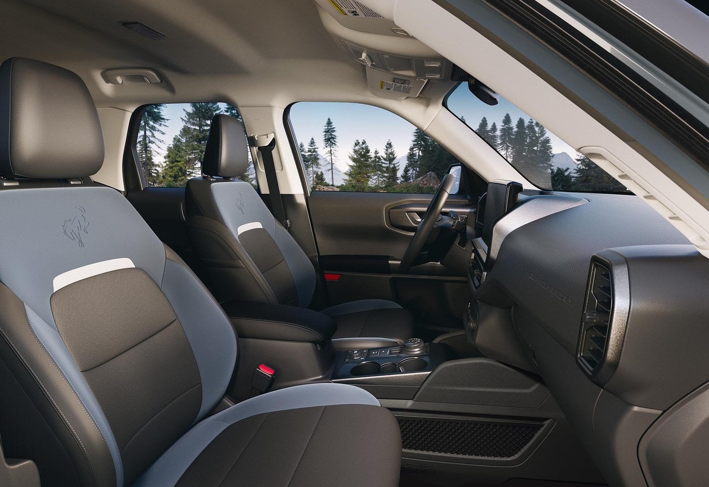 Ford Bronco Sport interior showing the front seats and dashboard