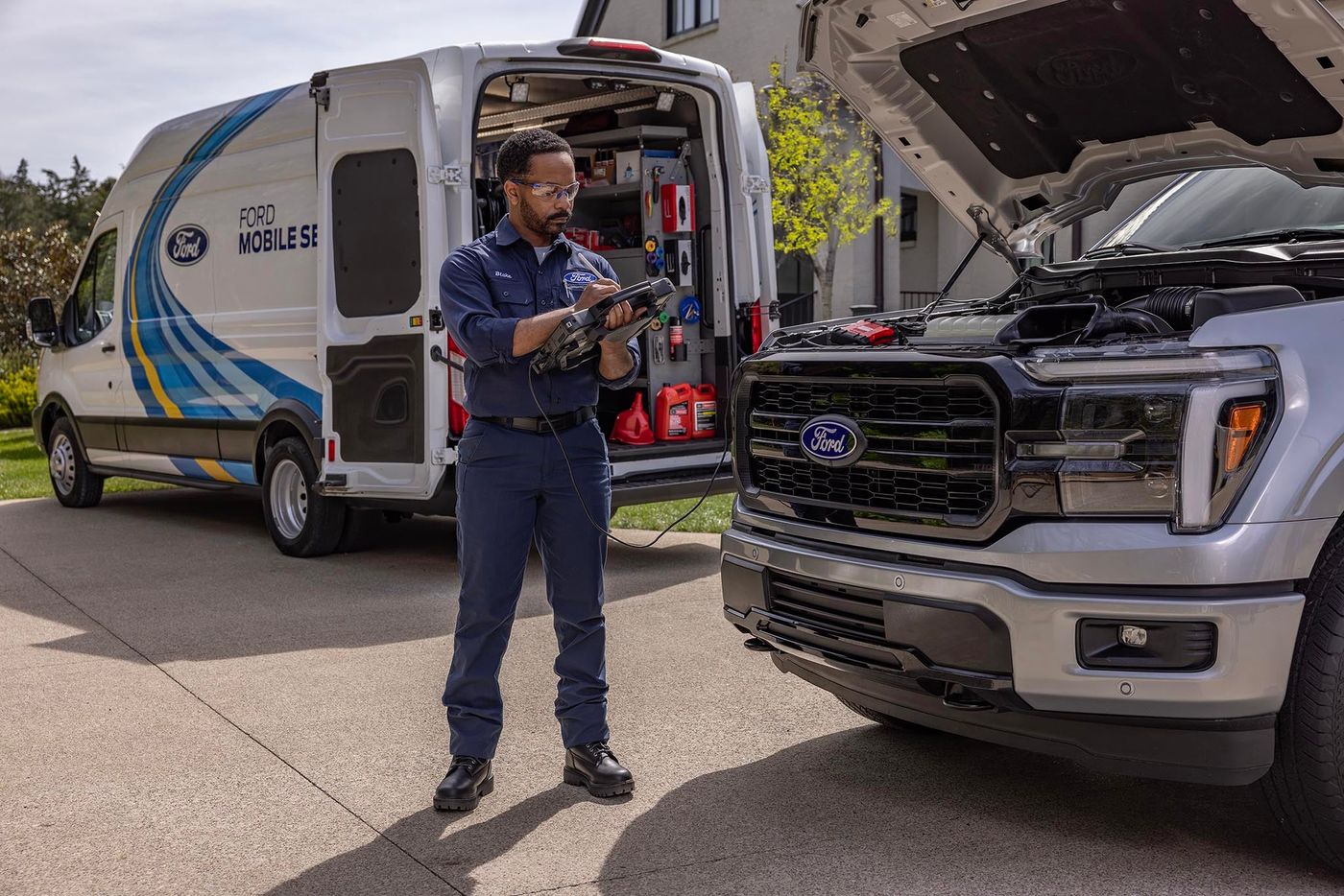 Ford technician performing a maintenance test on a Ford F-150, a heat season check for Gordon, TX owners